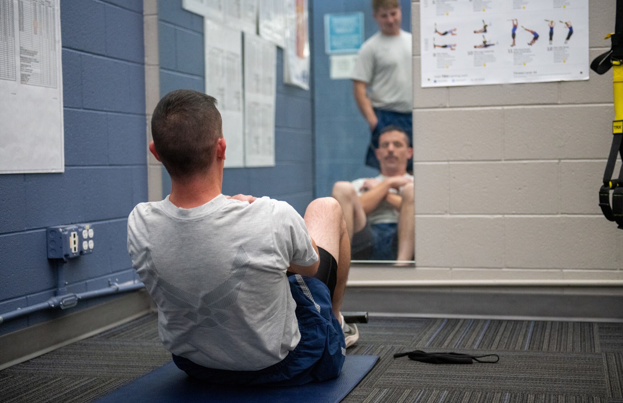 U.S. Air Force Tech. Sgt. Kenneth Peterson, 419th Aircraft Maintenance Squadron, does situps during a PT test at Hill Air Force Base, Utah on Oct. 3, 2021.