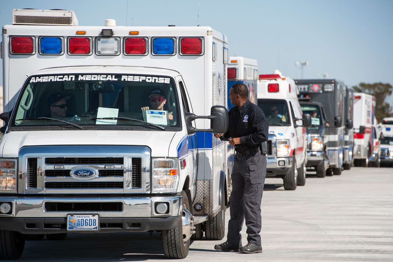 Emergency vehicles line up.