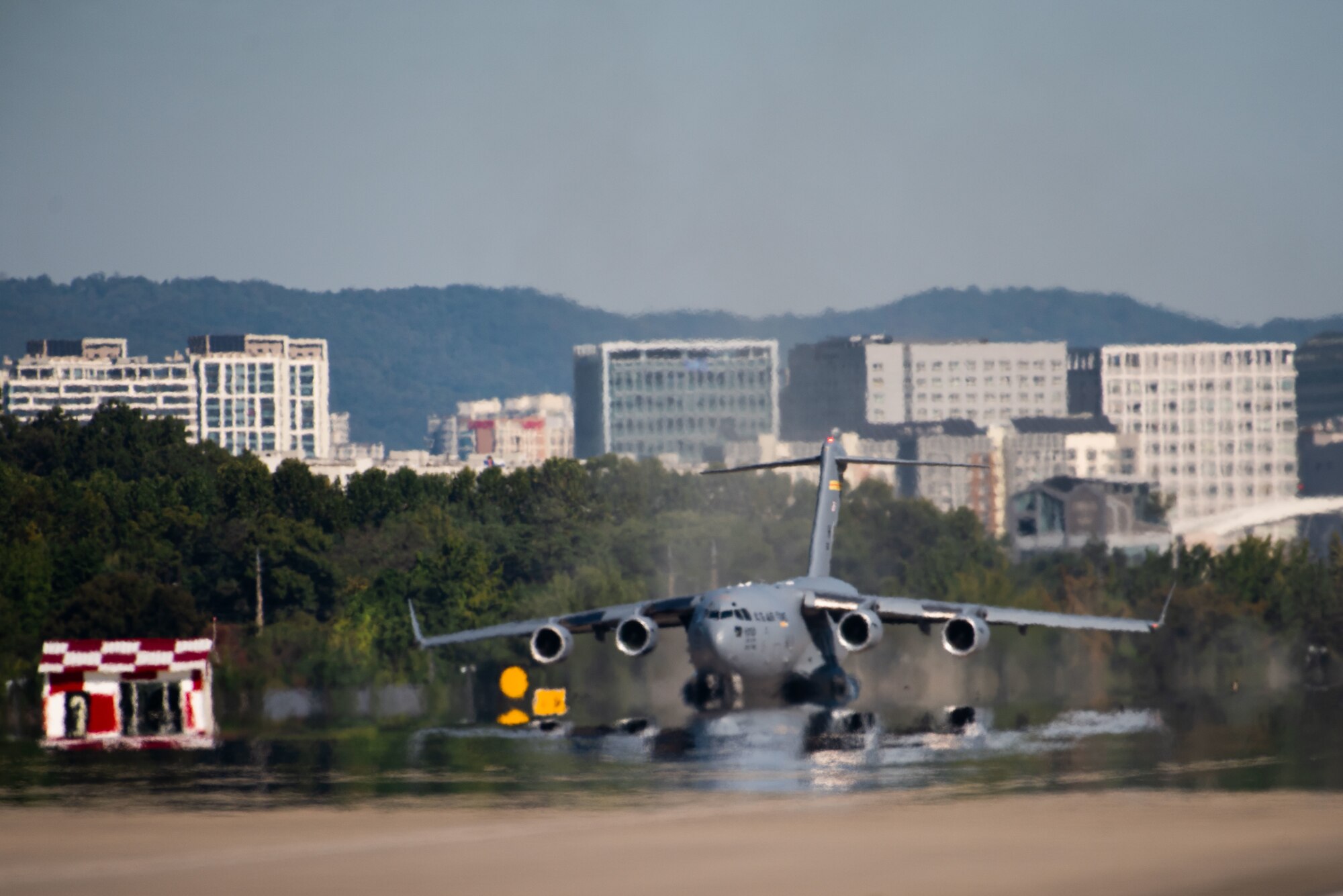 A C-17 Globemaster III begins takeoff at Seoul Air Base, Republic of Korea, Oct. 17, 2021. The aircraft was performing a demonstration for the Seoul International Aerospace and Defense Exhibition, also known as Seoul ADEX 21. Seoul ADEX 21 is the largest, most comprehensive event of its kind in Northeast Asia, attracting aviation and aerospace professionals, key defense personnel, aviation enthusiasts and the general public alike. Seoul ADEX 21 offers a venue to deepen the U.S. relationship with the ROK and enhance regional security though expanded military-to-military cooperation and with regional partners and allies.