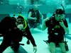 Courtesy Photo | Juan Carrasco (left), Master Sgt. Neil Ashley (center), and Spc. Joseph Suarez (right) posed for a photo during an Intro to Scuba class offered by the Fort Drum Soldier Recovery Unit, New York, at the Magrath Gym on July 15.