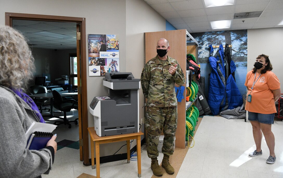 Maj. Gen. Evan Dertien, commander, Air Force Test Center, speaks with Carrie McGrew, left, Services Office director, and Amy Malone, Outdoor Recreation programmer, during his visit to Arnold Air Force Base, Oct. 14, 2021. (U.S. Air Force photo by Jill Pickett) (This image has been altered by obscuring a badge for security purposes.)