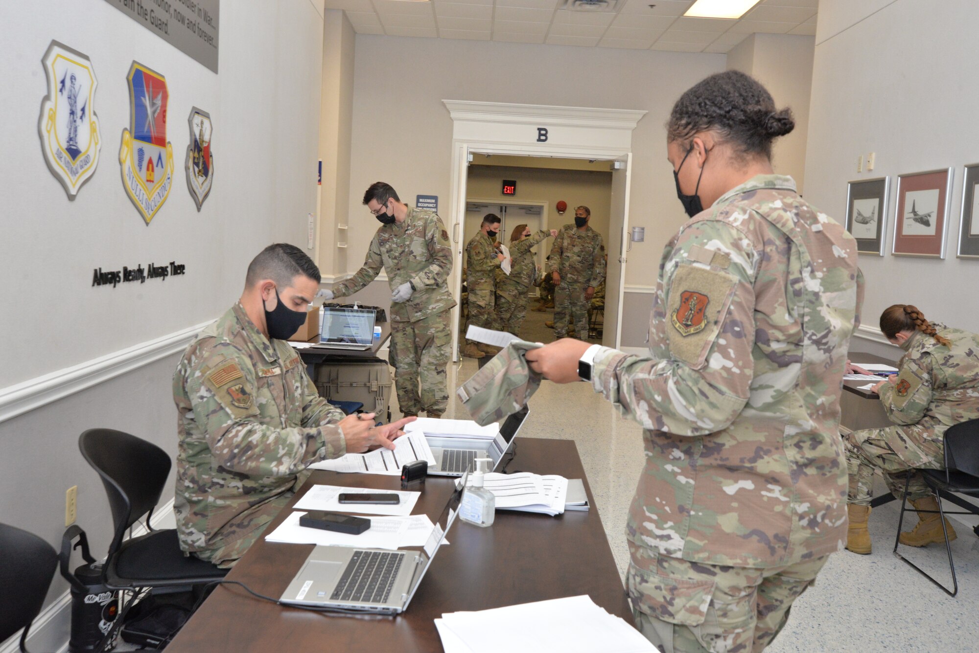 Airman checks in with medical on deployment line.