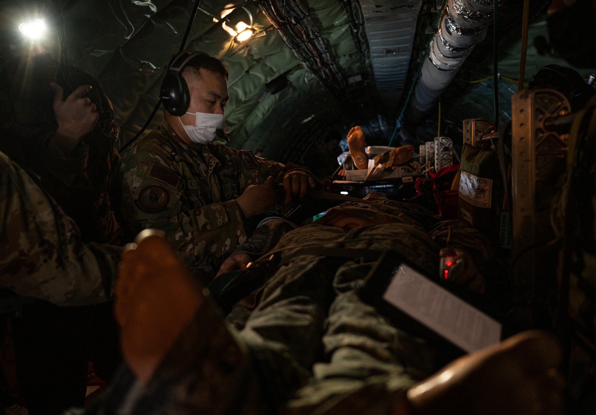 Airman sets up equipment on a KC-135.