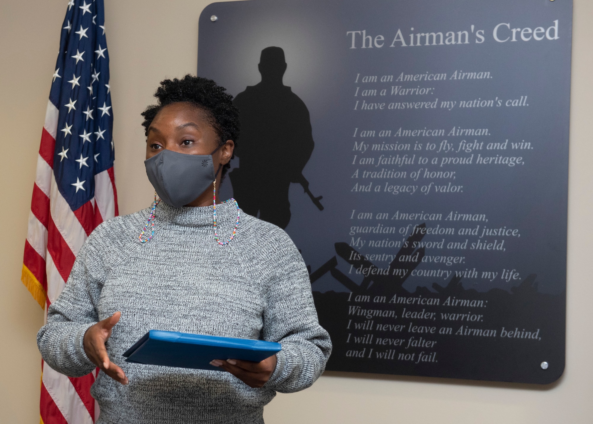 Tia Locklear, 88th Force Support Squadron process manager, speaks about her experience after completing the Masterminds course during a ceremony in which she received a completion certificate and a coin, Oct. 14, 2021, at Wright-Patterson Air Force Base, Ohio. The course is based on John C. Maxwell’s book “Everyone Communicates, Few Connect” and teaches strategies to ensure effective communication. (U.S. Air Force photo by Jaima Fogg)