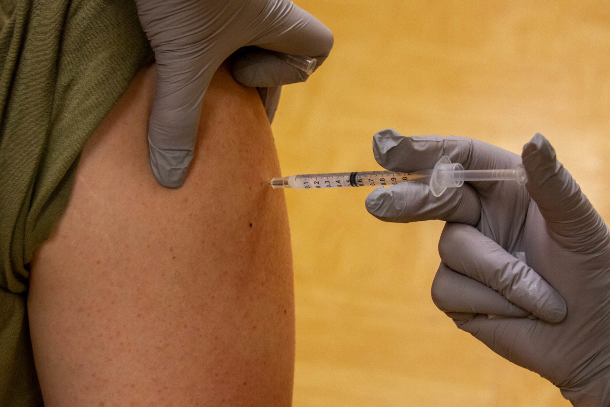 A Kentucky Army National Guard Soldier receives a COVID-19 vaccination at the Bluegrass Army Depot in Richmond, Kentucky Oct. 16, 2021. Soldiers and Airmen received the vaccine as part of Operation Fortified Guardian for the Kentucky National Guard.