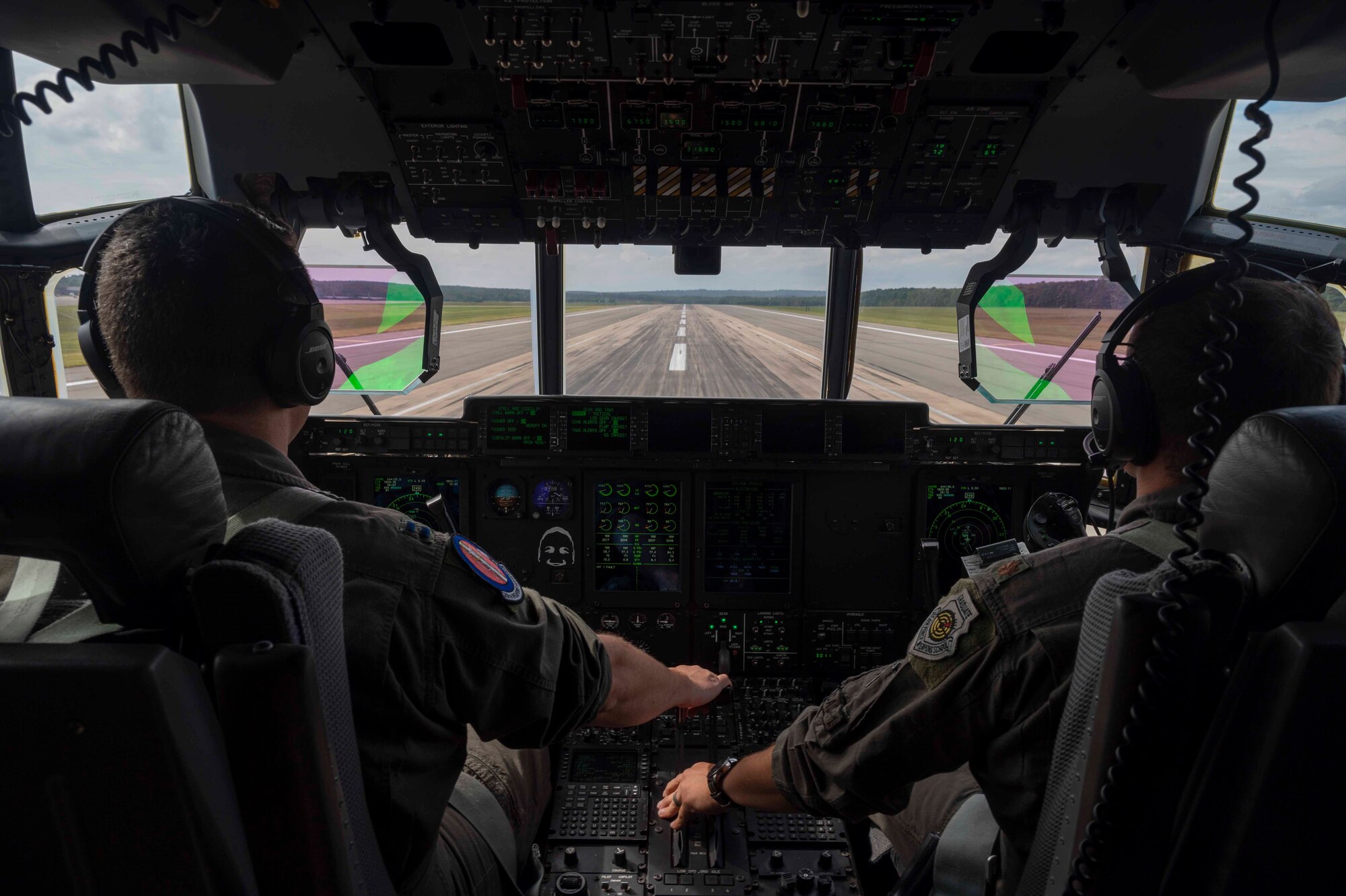 Two pilots prepare for takeoff