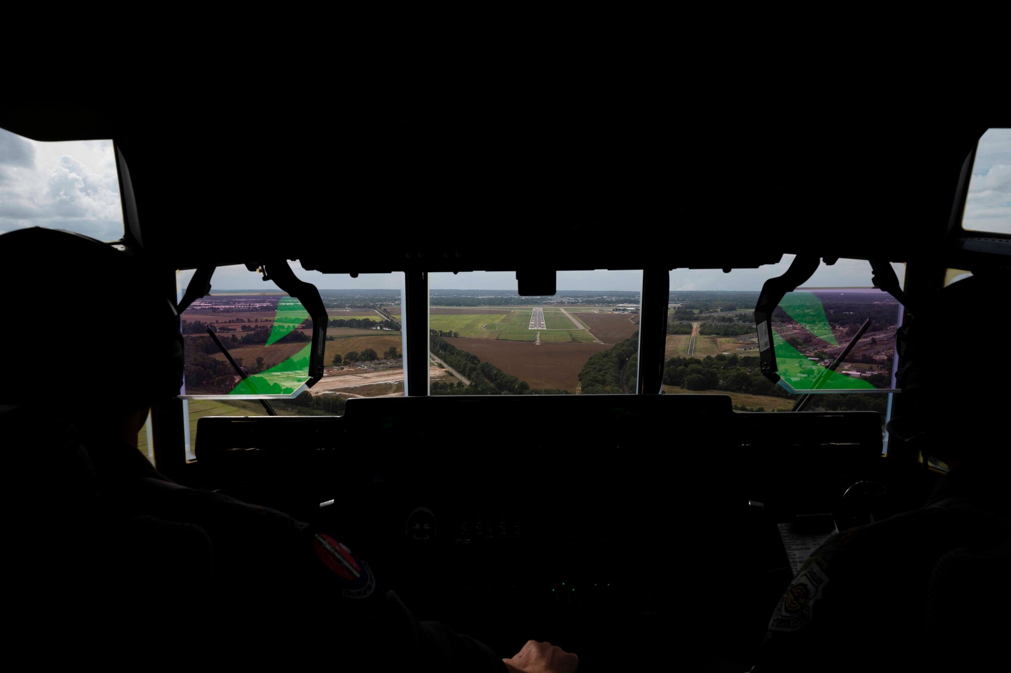 Two pilots prepare to land