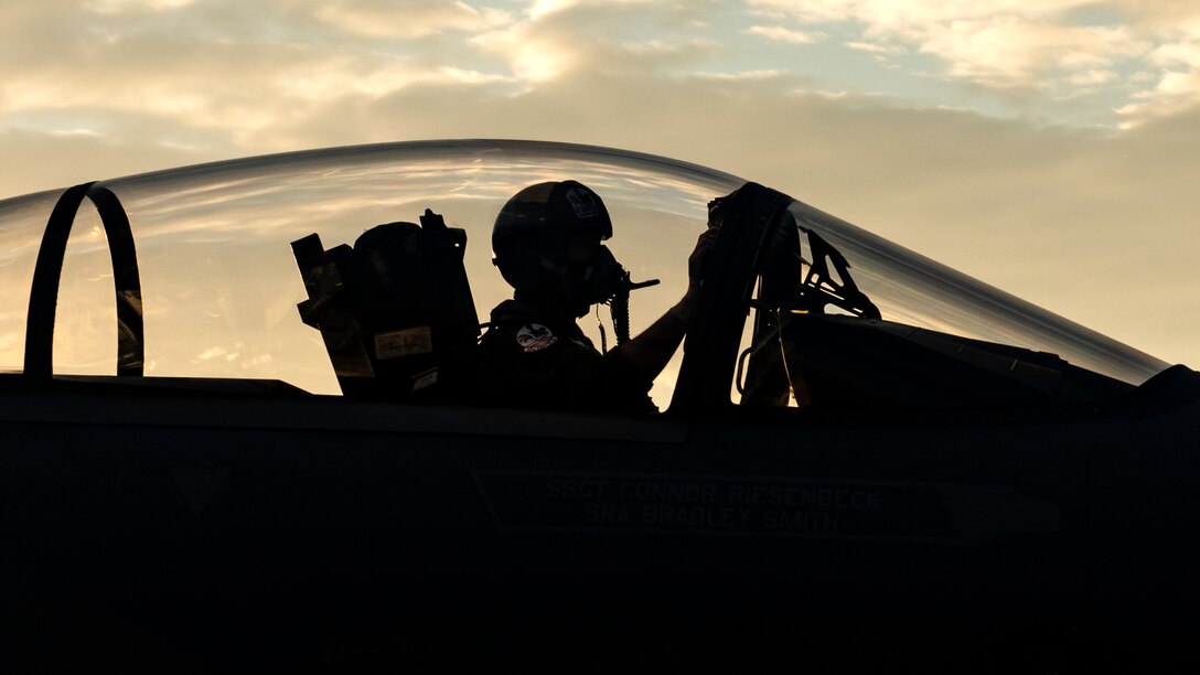 An F-15C Eagle pilot assigned to the 67th Fighter Squadron taxis down the flightline during a super surge exercise at Kadena Air Base, Japan, Oct. 19, 2021. 18th Wing fighter squadrons can fly more than 100 sorties a day while conducting surge operations, honing air-to-air tactics and advanced combat maneuvers. (U.S. Air Force photo by Senior Airman Jessi Monte)