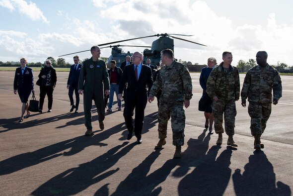 U.S. Air Force Col. Brian Filler, right, 501st Combat Support Wing commander, Chief Master Sgt. Ralph Oliver, second right, 423rd Air Base Group command chief, U.S. Air Force Col. Jon Hannah, center, 422nd Air Base Group commander, U.S. Air Force Col. Charles Metrolis, second, U.S. Embassy U.S. Defense Air Attaché, and Royal Air Force Sq. Ldr. Jayne Robertson, left, RAF commander for RAF Fairford, welcome Admiral Charles “Chas” Richard, U.S. Strategic Command Commander, during a visit to Royal Air Force Fairford, England, Oct. 20, 2021. Richard visited Fairford to to immerse with Airmen from the 9th Expeditionary Bomb Squadron who are temporarily stationed at Fairford for a BTF deployment. USSTRATCOM forces are on watch 24 hours a day, seven days a week to deter and defeat attacks against the U.S. and our allies. (U.S. Air Force photo by Senior Airman Jennifer Zima)