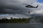 Virginia Army National Guard flight crews conduct water bucket training with UH-60 Black Hawk helicopters Oct. 12, 2021, at a training area in Chesterfield, Virginia. These Soldiers are scheduled to deploy to Kosovo with the 2nd Battalion, 224th Aviation Regiment, 29th Infantry Division in early 2022, where firefighting capabilities may be needed.