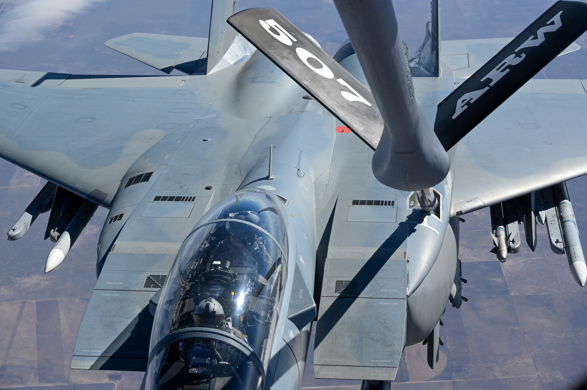 An F-15EX assigned to the 85th Test and Evaluation Squadron, Eglin Air Force Base, Florida, receives fuel from a KC-135 assigned to the 465th Air Refueling Squadron, Tinker AFB, Oklahoma, Oct. 15, 2021. In-air refueling allows fighter aircraft to stay airborne for longer periods of time without having to land to refuel. (U.S. Air Force photo by 2nd Lt. Mary Begy)