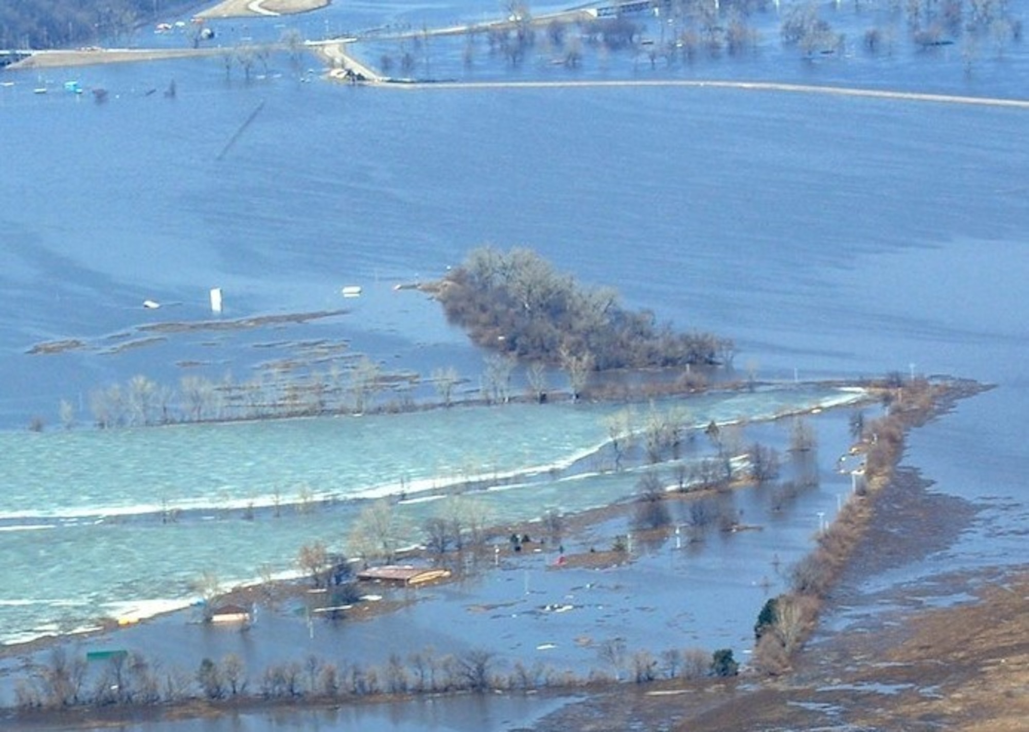 In March 2019, flood waters covered more than 30% of Offutt Air Force Base, Neb. This aerial picture shows the installation’s base lake recreation area facilities after flood waters started to recede. The U.S. Army Corps of Engineers, Omaha District, recently awarded more than $16 million for the first two military construction contracts as a result of the damage.