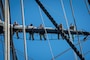 Petty officers first class, selected for promotion to chief petty officer, climb on main topyard aboard USS Constitution during Chief Petty Officer Heritage Weeks.