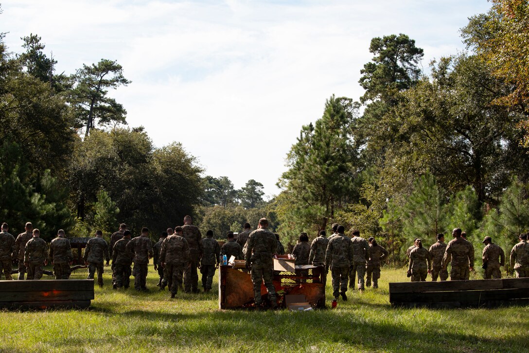 A photo of Airmen conducting a foreign object debris walk.