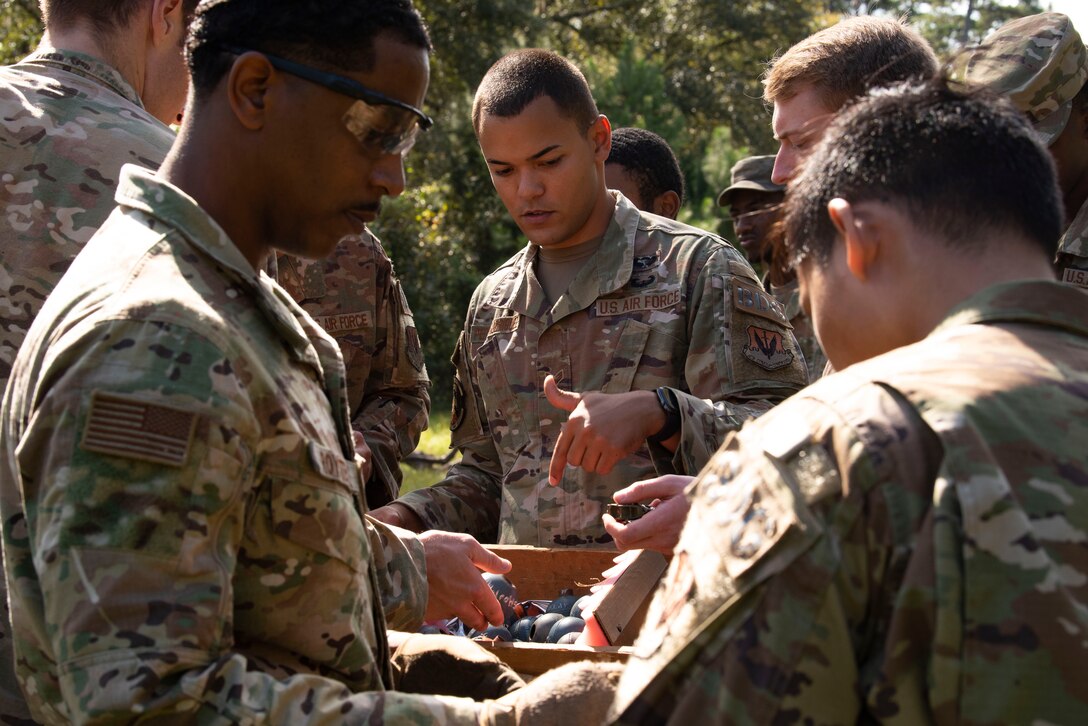 A photo of Airmen conducting a foreign object debris walk.