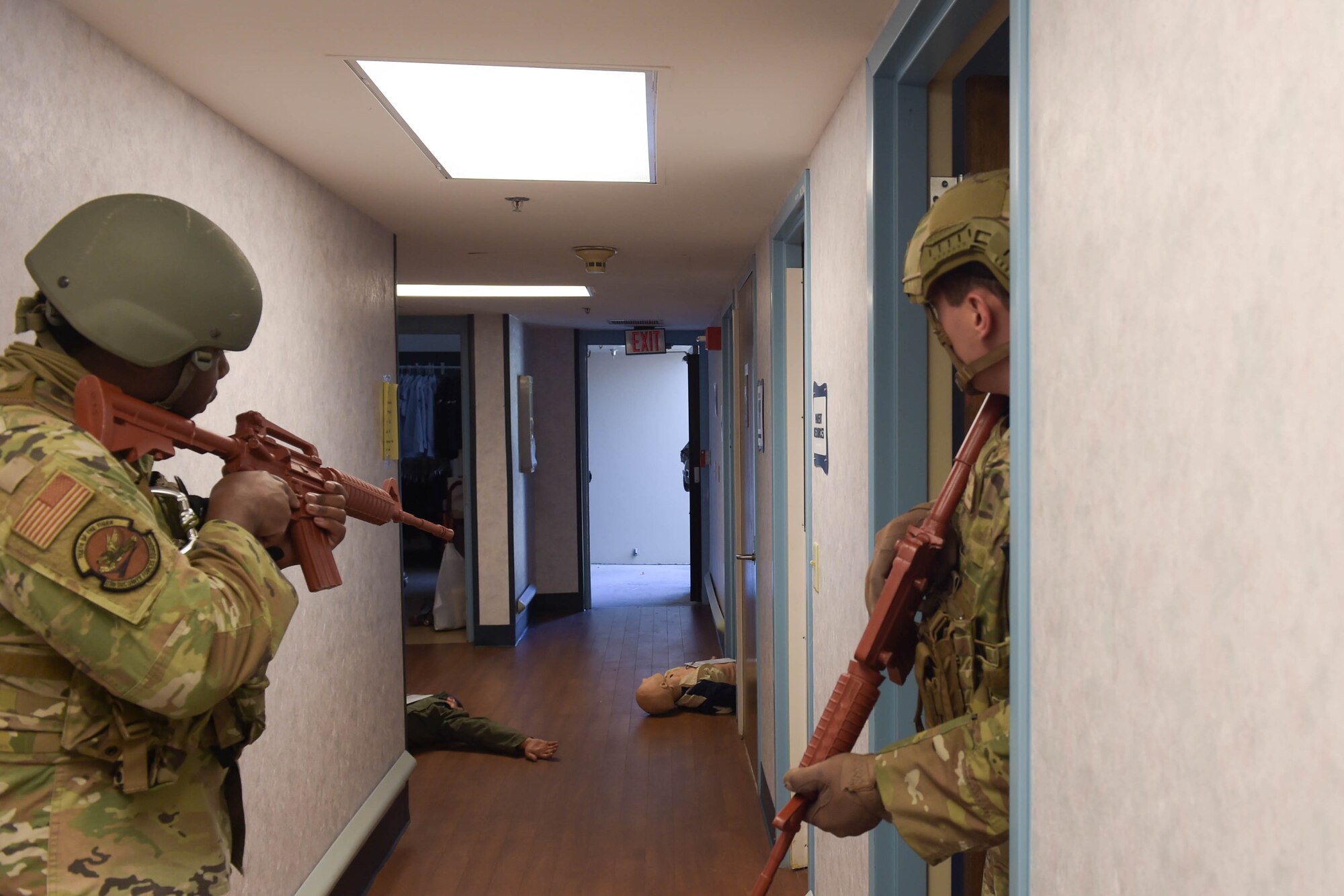 A photo of Airmen holding weapons.