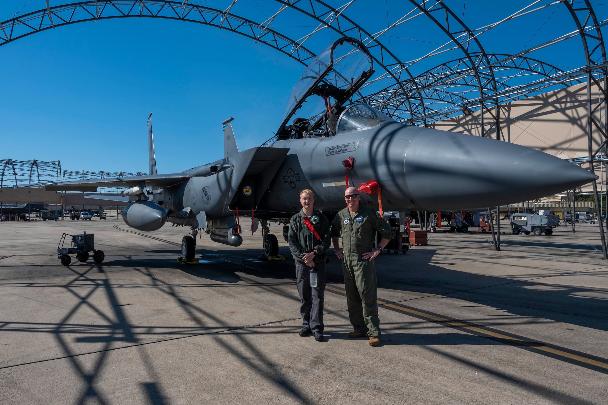 Lt. Col. Nicholas Johnson, 455th Flying Training Squadron commander, and his son Senior Airman Brycen Johnson, 333rd Fighter Generation Squadron assistant dedicated crew chief, reunite at Seymour Johnson Air Force Base, North Carolina, Oct. 19, 2021.