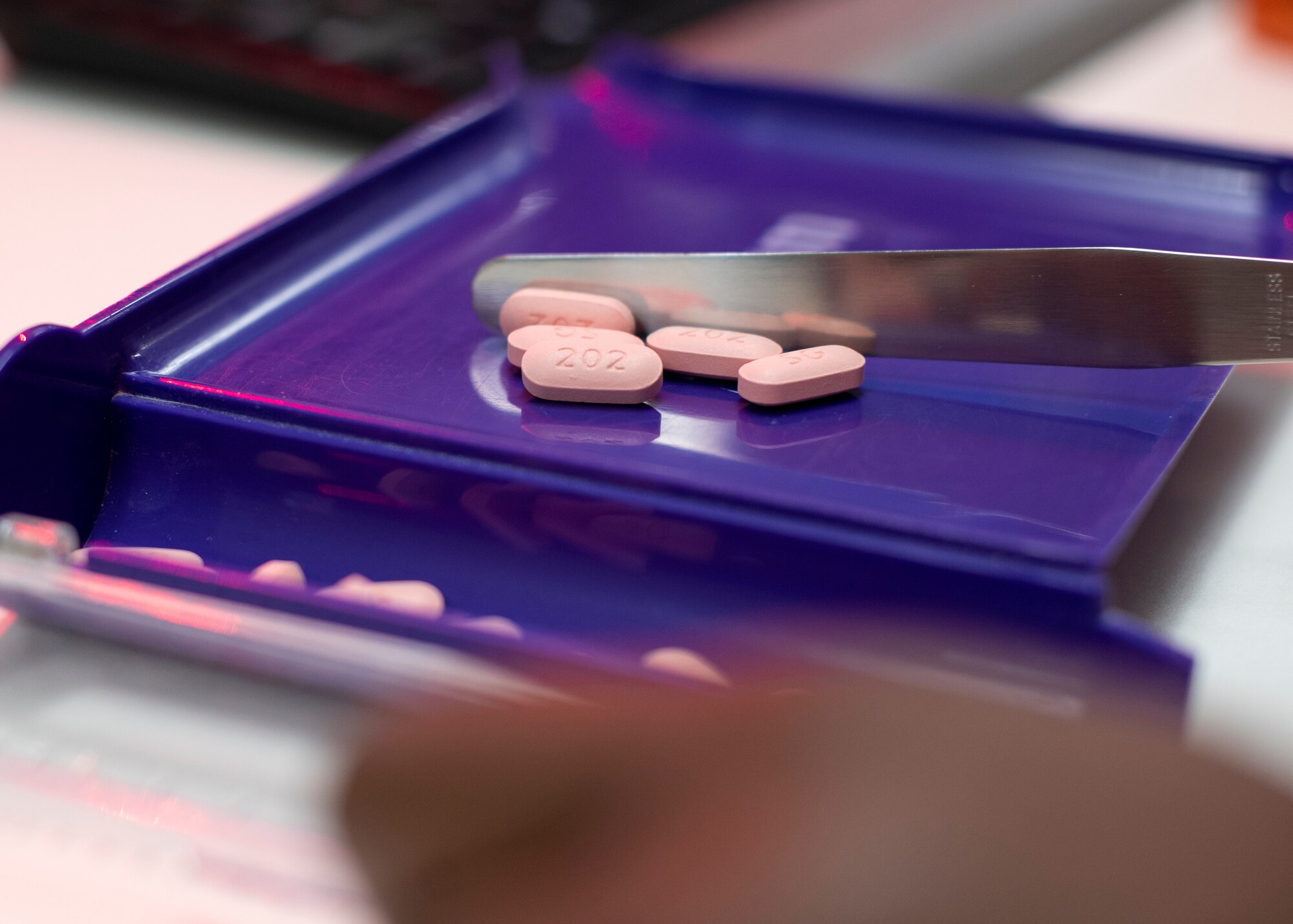 U.S. Air Force Senior Airman Aisha Jennings, 6th Medical Support Squadron pharmacy technician, verifies prescriptions at MacDill Air Force Base, Oct. 20, 2021.