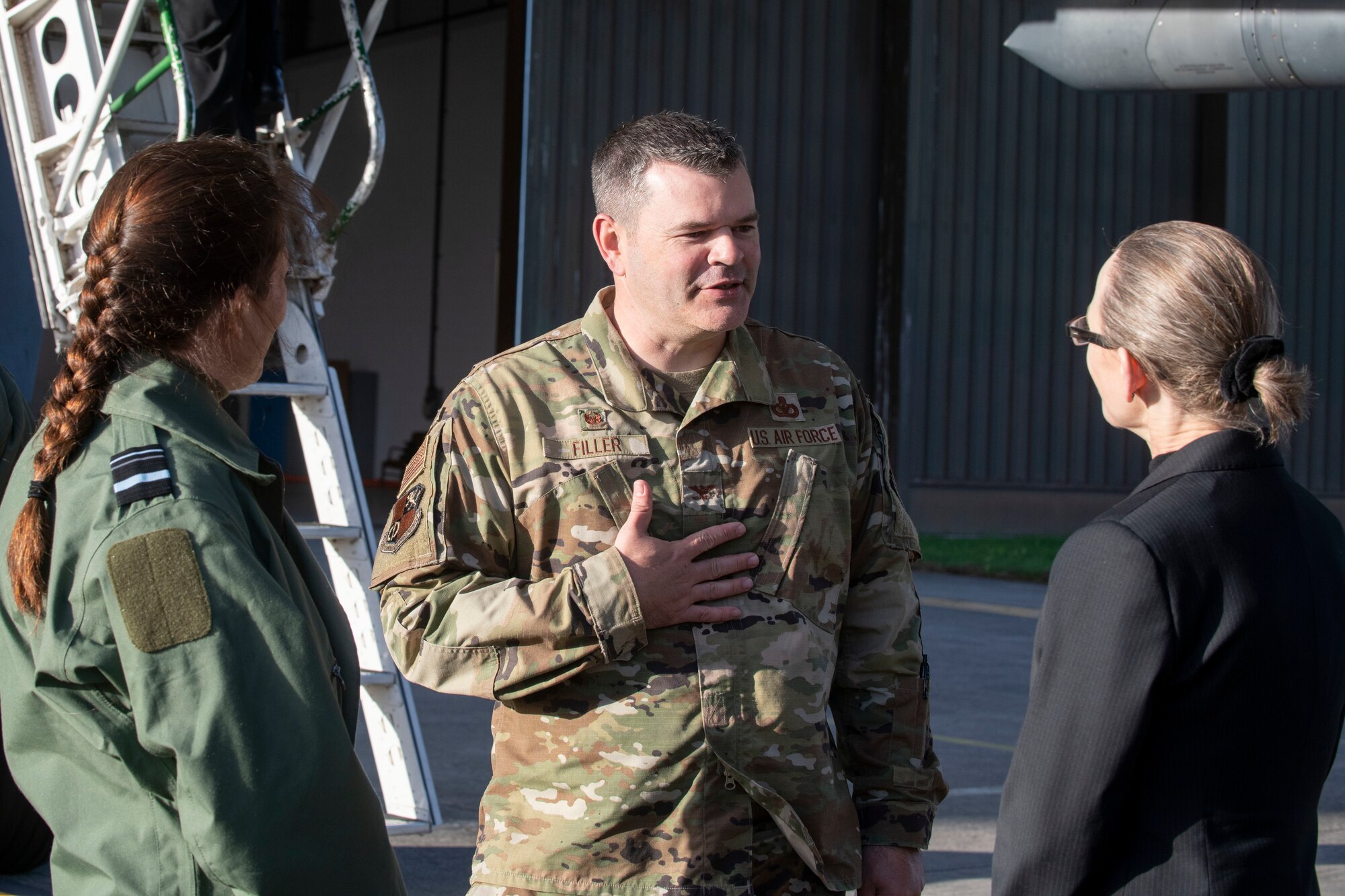 U.S. Air Force Col. Brian Filler, center, 501st Combat Support Wing commander, speaks with Air-Vice Marshal Suraya Marshall, left, RAF Air Officer Commanding Number 2 Group, and a member of the U.S. Embassy-London staff, during a visit to Royal Air Force Fairford, England, Oct. 20, 2021. Bomber Task Force missions are our most visible symbol of assurance and commitment to our allies and provide deterrence against potential adversaries. (U.S. Air Force photo by Senior Airman Jennifer Zima)