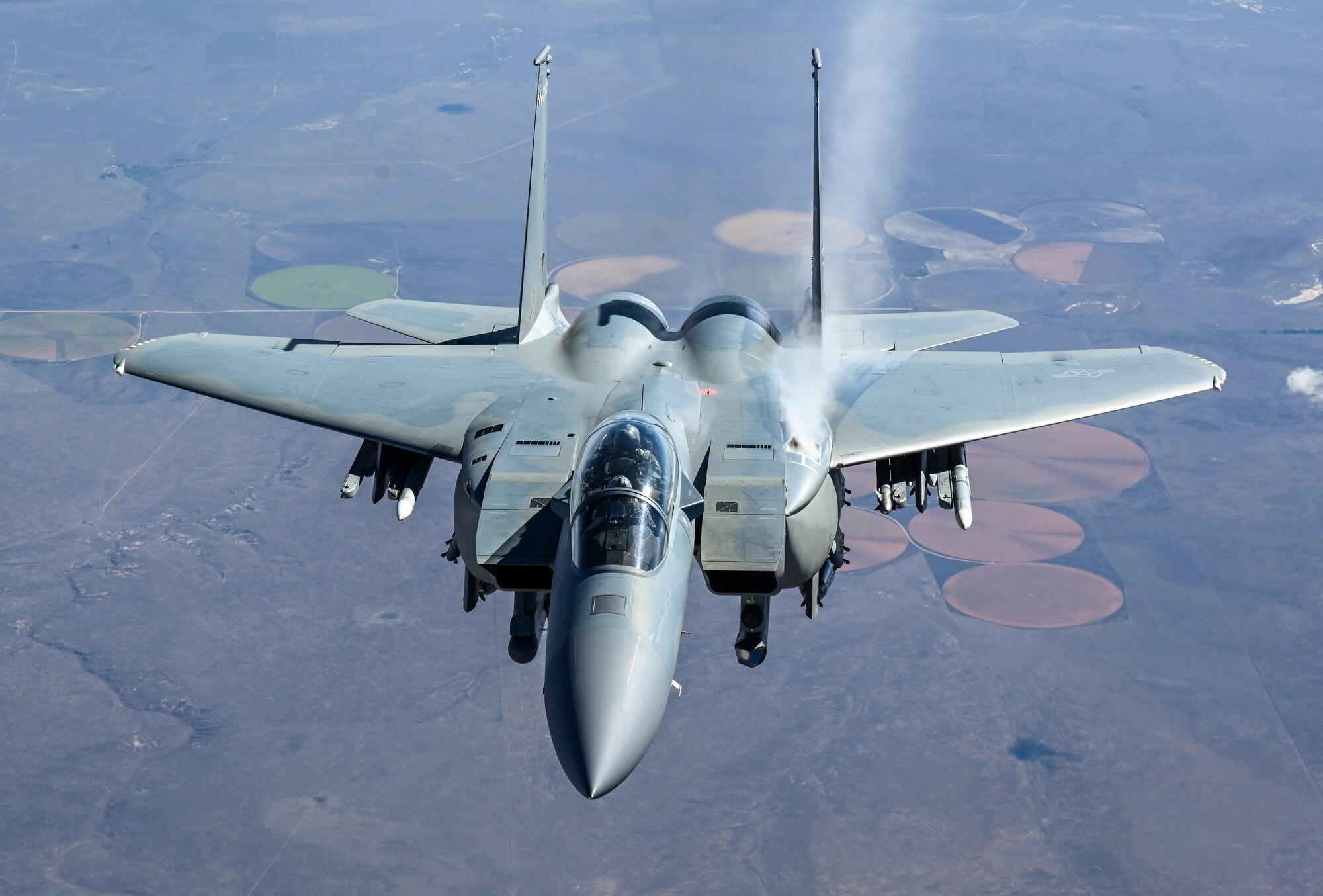 A F-15EX assigned to the 85th Test and Evaluation Squadron, Eglin Air Force Base, Florida, flies behind a KC-135 assigned to the 465th Air Refueling Squadron, Tinker AFB, Oklahoma, Oct. 15, 2021. In-air refueling allows fighter aircraft to stay airborne for longer periods of time without having to land to refuel. (U.S. Air Force photo by 2nd Lt. Mary Begy)