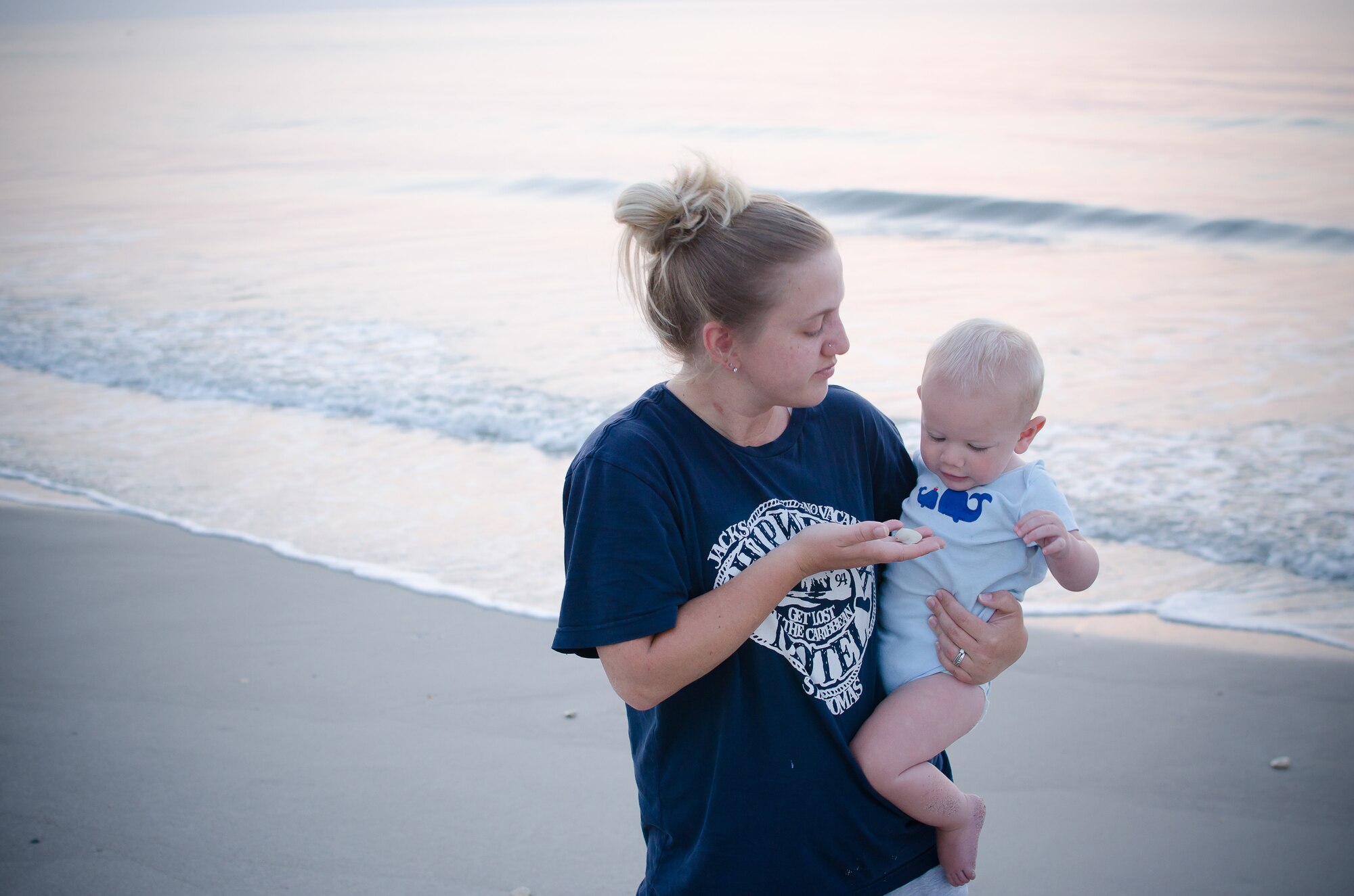 Heather Heiney, 341st Missile Wing Public Affairs, holds her son, Nathan Heiney, May 23, 2014 at Patrick Air Force Base, Fla.