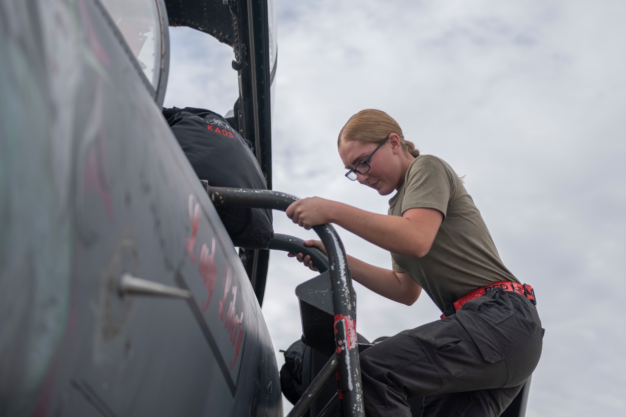 An Airman climbs the ladder of an F-15E Strike Eagle