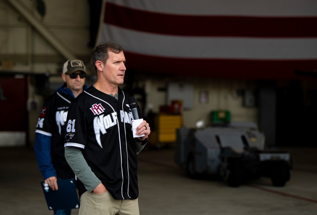 Col. John “Wolf” Gallemore, 8th Fighter Wing commander, and Chief Master Sgt. Thomas “Wolf Chief” Schaefer, 8th FW command chief, give opening remarks during the Third Quarter Load Crew Competition at Kunsan Air Base, Republic of Korea, Oct. 16, 2021. Load crew competitions are held for training and to build esprit de corps. (U.S. Air Force photo by Senior Airman Suzie Plotnikov)
