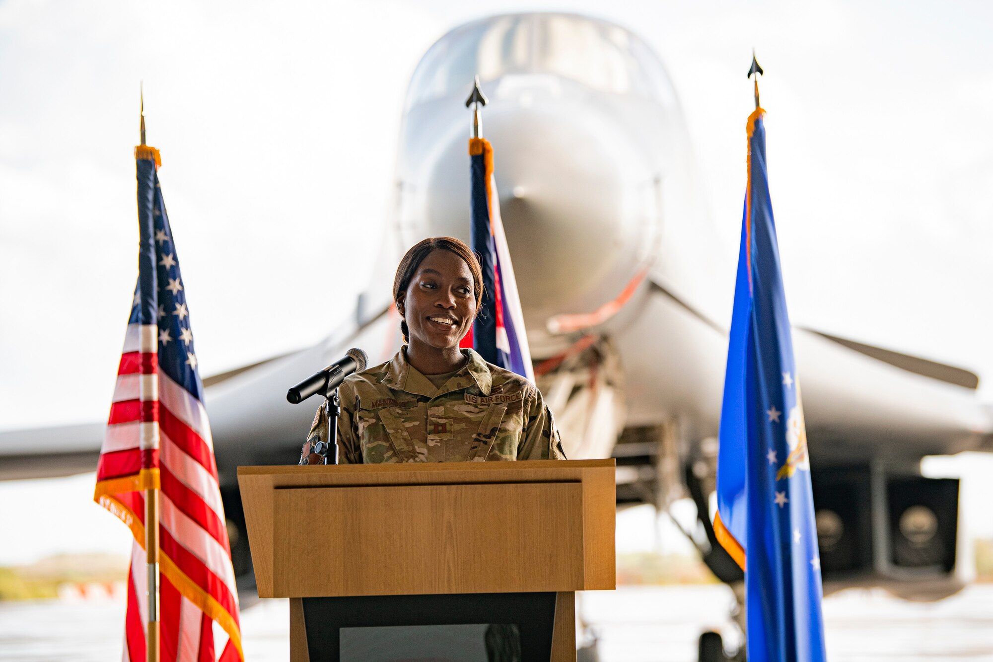 Capt. Jasmine Manning, 501st Combat Support Wing public affairs chief, speaks during a Bomber Task Force press conference at RAF Fairford, England, Oct. 20, 2021. Distinguished visitors toured the base  to immerse with Airmen from the 9th Expeditionary Bomb Squadron who are temporarily stationed at Fairford for a BTF deployment. BTF deployments drive our allied and partnered coalition’s ability to continuously deliver airpower anywhere, anytime, and collectively build future operation capabilities in the defense of Europe as a whole. (U.S. Air Force photo by Senior Airman Eugene Oliver)
