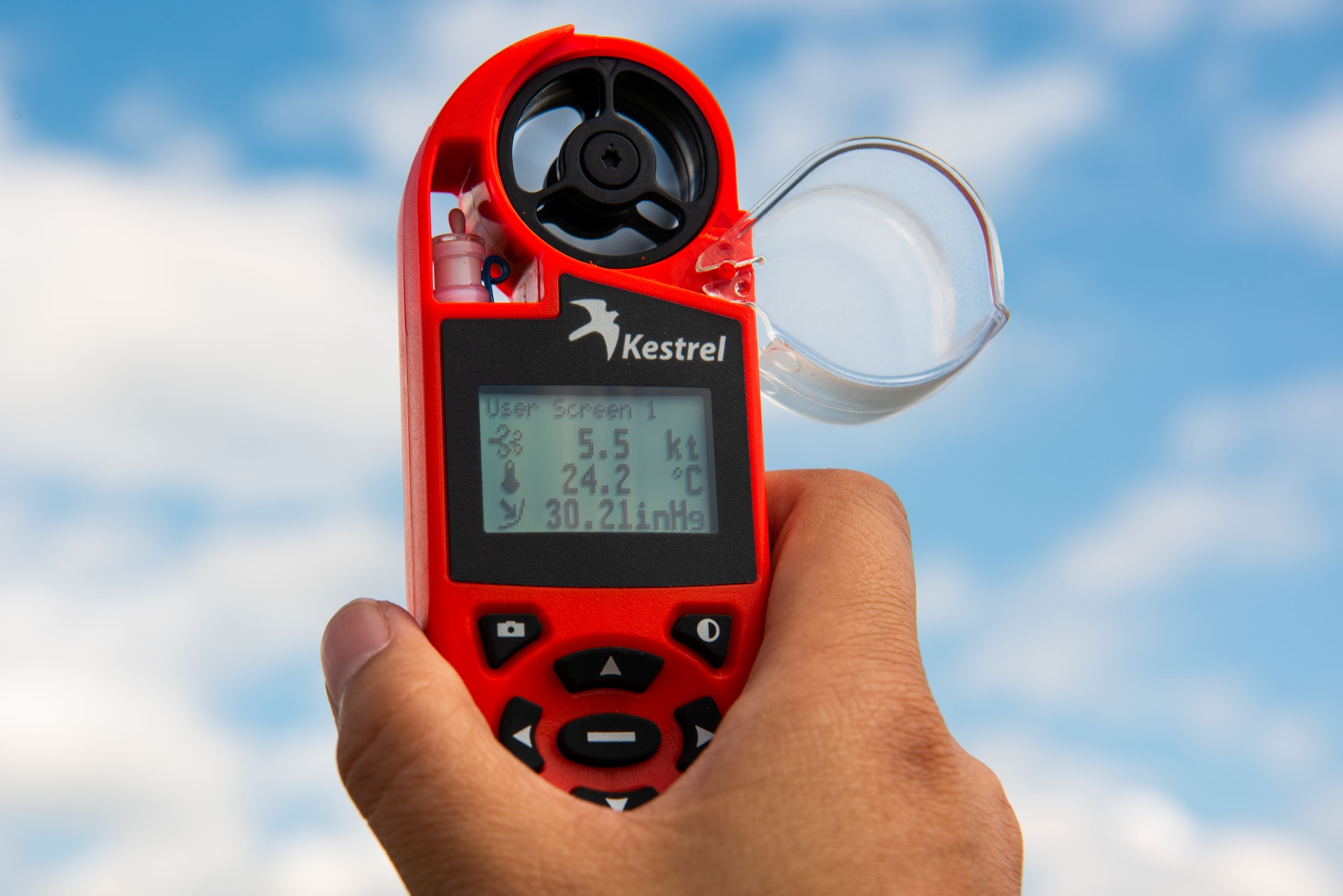 Tech. Sgt. Isabelle Qi, 51st Operations Support Squadron airfield services element non-commissioned officer-in-charge, utilizes a Kestrel Weather Meter at Osan Air Base, Republic of Korea, Oct. 13, 2021.
