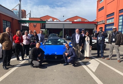 Visiting personnel, to include the 405th Army Field Support Brigade’s Army Field Support Battalion Africa and LRC Italy, pose for a photo in front of Maserati’s newest supercar release – the quarter million dollar MC20 – at the Maserati headquarters in Modena, Italy. Keli’i Bright, LRC Italy director, (center right) said one of the biggest takeaways from the visit was the reciprocal relationship between the Department of Defense and civilian industry. (U.S. Army courtesy photo)
