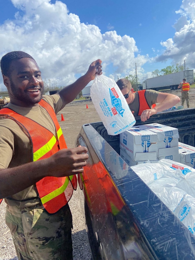 Ohio Army National Guard Soldiers help distribute ice to residents in Louisiana’s Terrebonne Parish after Hurricane Ida struck the state Aug. 29, 2021. About 170 Soldiers from the 112th Transportation Battalion provided support to the Louisiana National Guard Sept. 13-25, 2021.
