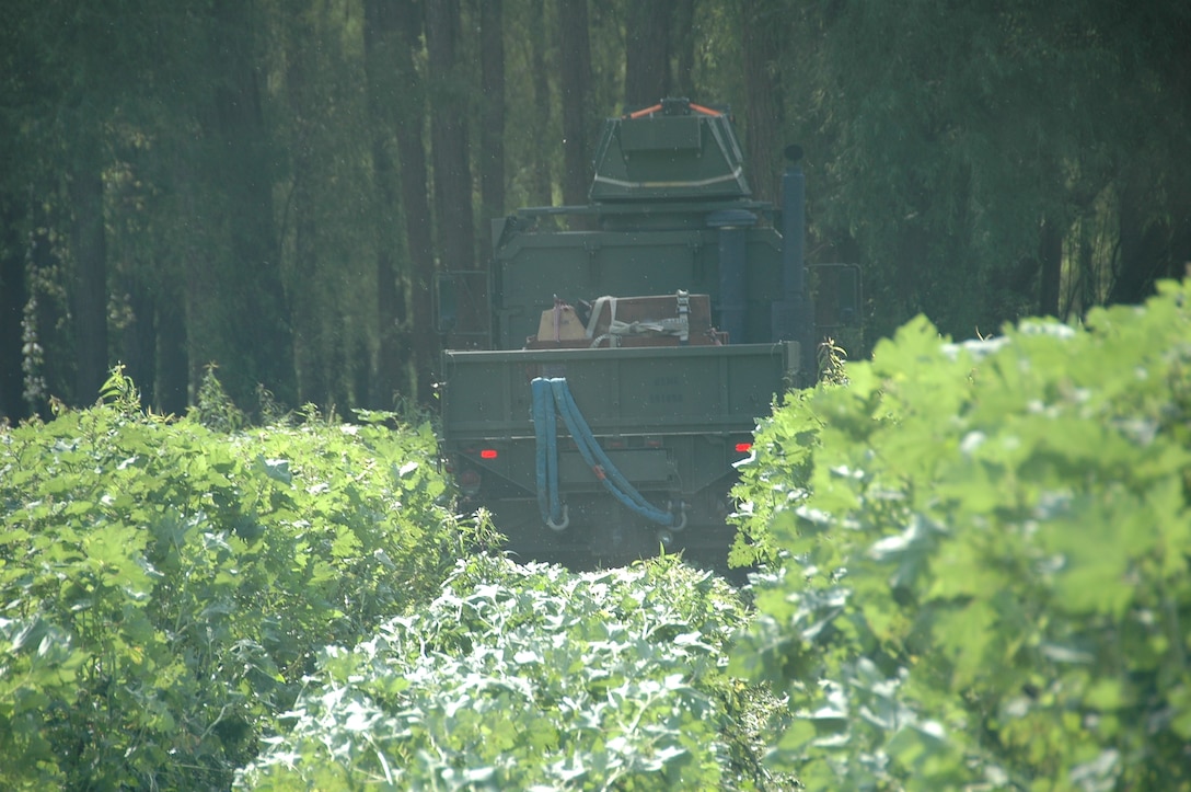 A U.S. Marine Corps vehicle makes a pass on soft soil for the Vehicle Cone Index test (VCI). The VCI test measures the soil strength needed for a vehicle to make one pass. (U.S. Army Corps of Engineers photo)