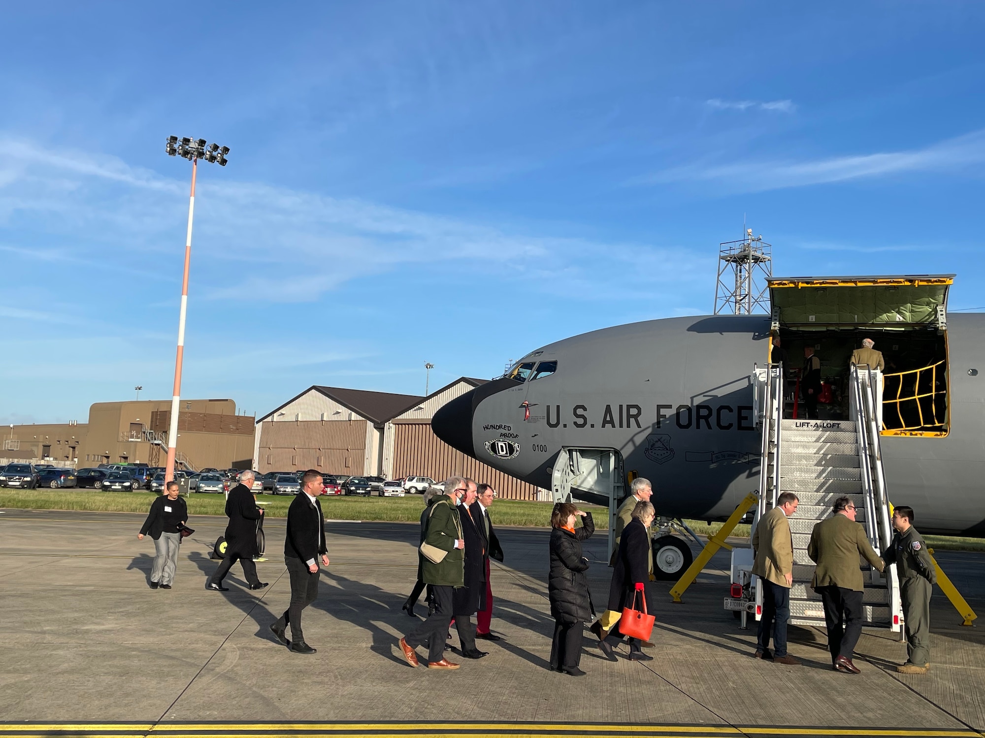 High sheriffs and deputy lieutenants from the Suffolk, Norfolk and Cambridgeshire counties of England tour a KC-135 Stratotanker aircraft assigned to the 100th Air Refueling Wing at Royal Air Force Mildenhall, England, Oct. 21, 2021. The high sheriffs and deputy lieutenants toured the base as part of a familiarization visit to learn about Team Mildenhall's mission sets and global impact. (U.S. Air Force photo by Senior Airman Joseph Barron)