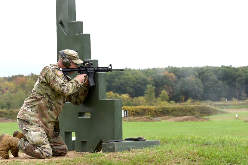 U.S. Army Chief Warrant Officer 4 Dean Miller, 177th Regiment, Regional Training Institute, Michigan Army National Guard, conducts the Army’s new individual weapons qualification course, Fort Custer Training Center, Augusta, Mich., Oct. 15, 2021. The new course replaces the previous annual marksmanship qualification standards with one that requires Soldiers to engage targets faster and to operate as they would in combat.