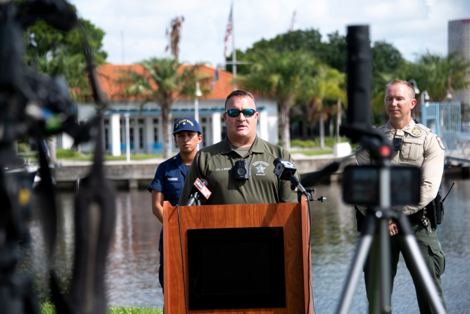 Hillsborough County Sheriff’s Office Cpl. Jeramy Manis speaks to the media about Operation Dry Water and boater safety, Tampa, Florida, July 1, 2021. Operation Dry Water is a national campaign that warns boaters of the dangers of boating under the influence. The Coast Guard and interagency partners Florida Fish and Wildlife Conservation Commission and Hillsborough County Sheriff’s Office held the press event as part of efforts to keep the public safe on the water for the Fourth of July holiday, stressing the importance of wearing a life vest, knowing how to safely operate a vessel, and never boating under the influence. (DoD photo by Coast Guard Petty Officer 1st Class Lisa Ferdinando)
