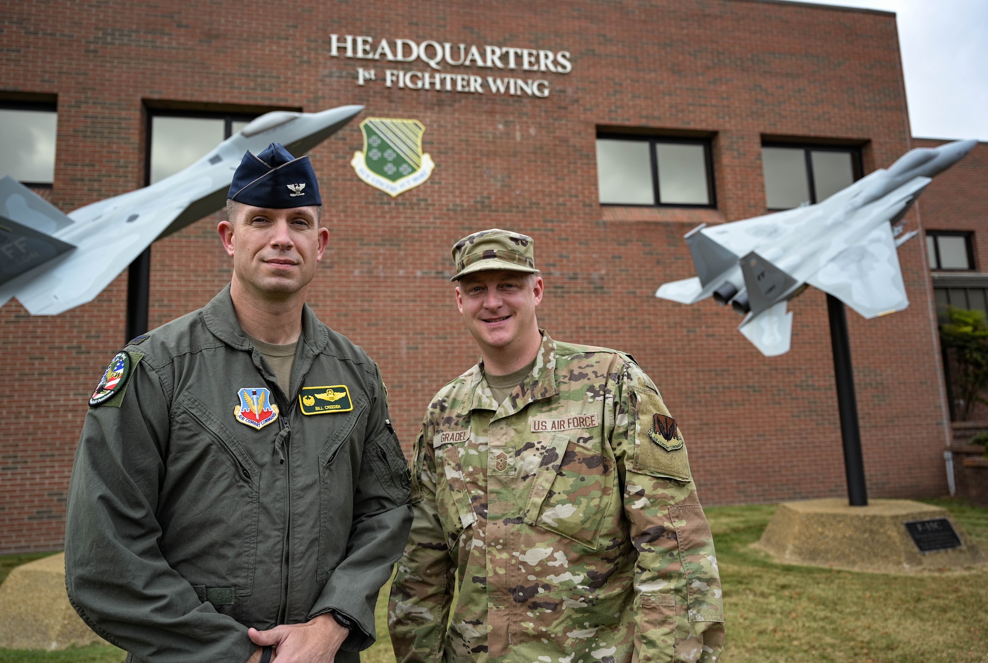 The 1st Fighter Wing command team poses for a photo.