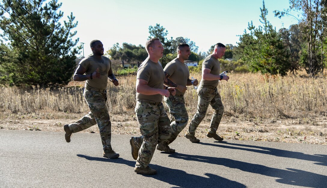 Space Launch Delta 30 Airmen and Guardians run for a mile as part of the West Coast Warriors First Responders Appreciation Week event on Oct. 15, 2021 to showcasing physical strength and endurance at Vandenberg Space Force Base, Calif. (U.S. Space Force photo by Airman 1st Class Rocio Romo)