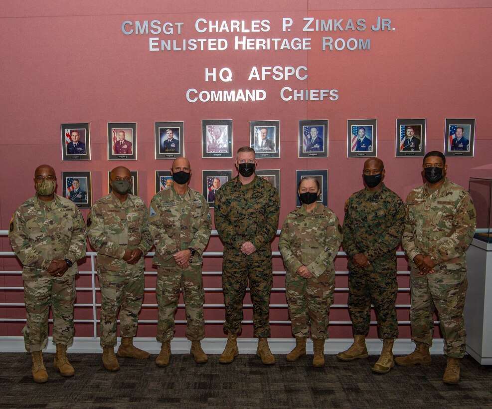 U.S. military senior enlisted leaders pose for a photo.