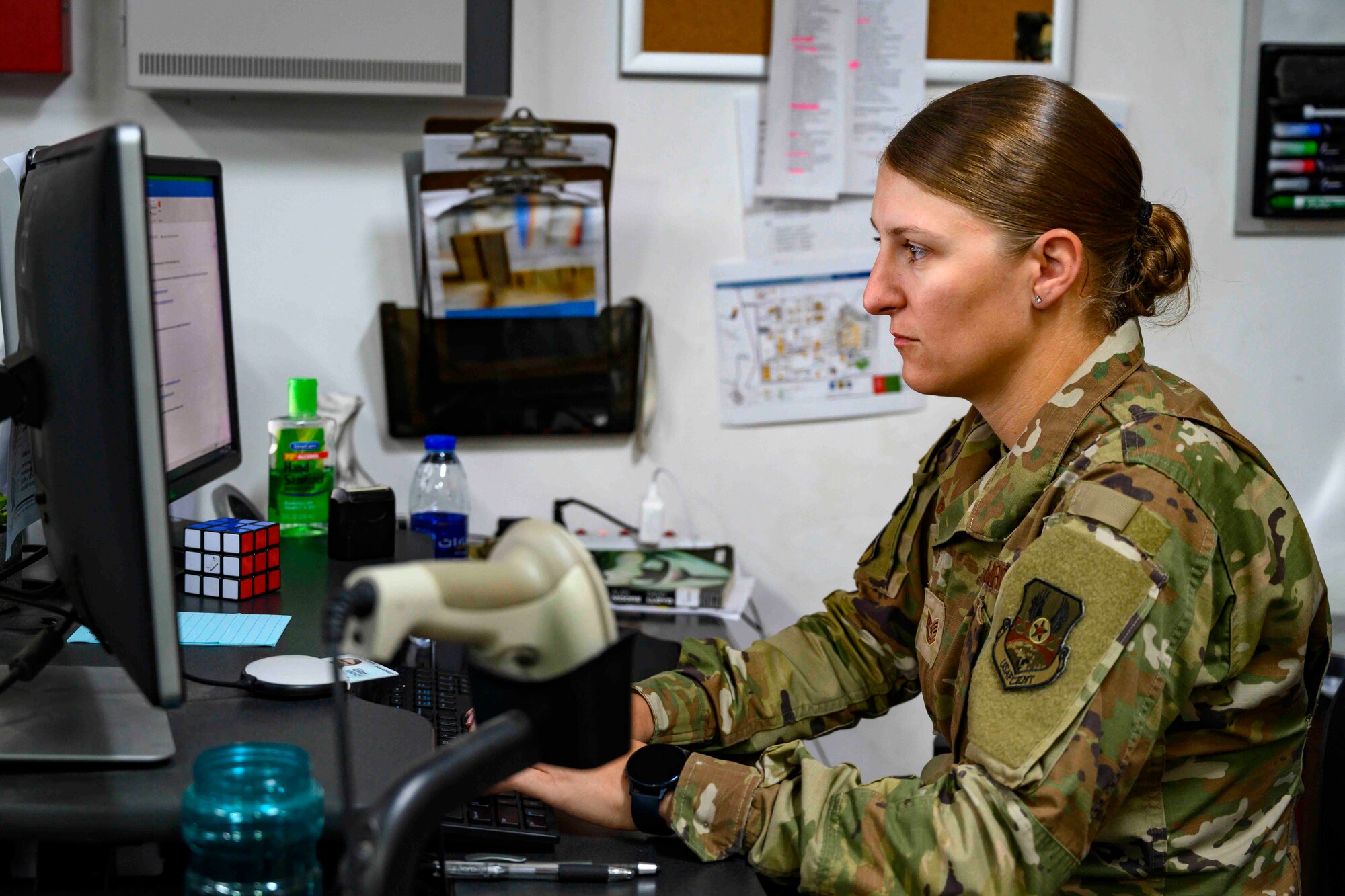 Airman working on computer in learning resource center