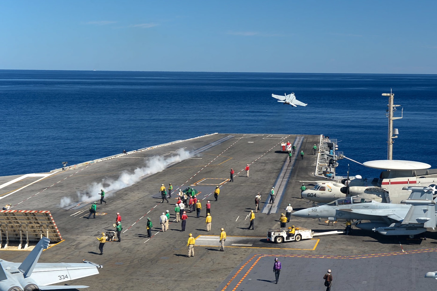 An F/A-18E Super Hornet, attached to the “Blue Blasters” of Strike Fighter Squadron (VFA) 34, launches from the flight deck of the Nimitz-class aircraft carrier USS Harry S. Truman (CVN 75).