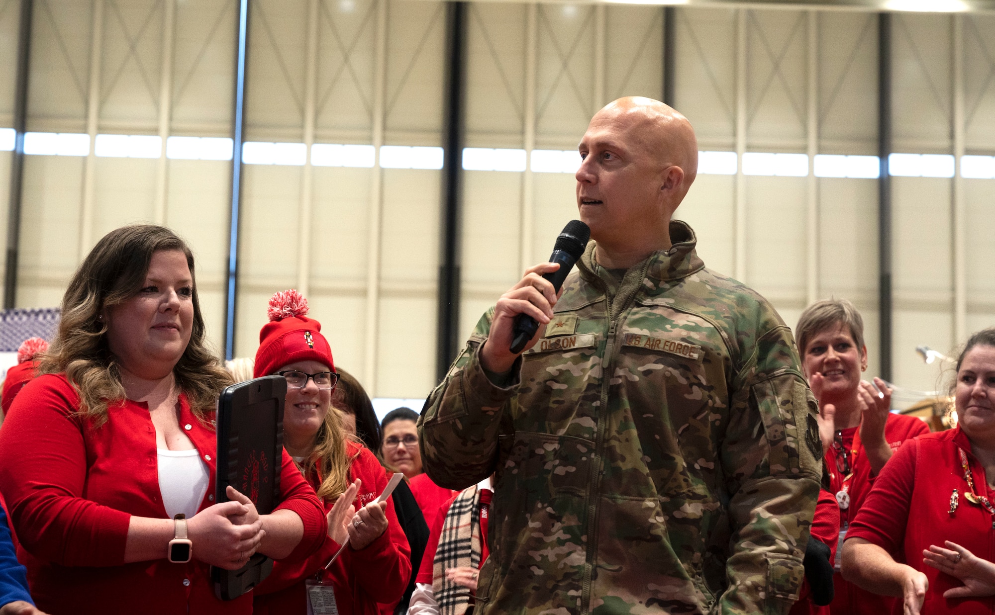 U.S. Air Force Brig. Gen. Joshua Olson, the 86th Airlift Wing commander, speaks at the 57th Annual Ramstein Bazaar, at Ramstein Air Base, Germany, Oct. 20, 2021. The Ramstein Bazaar is an event, which brings the local community together to kick off the holiday season. (U.S. Air Force photo by Senior Airman Thomas Karol)