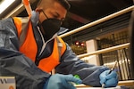 New York Army National Guard Staff Sgt Jonathan Vasconez, a member of the New York National Guard's 24th Civil Support Team, takes notes while collecting data at a testing location in the World Trade Center Subway Station in New York City Oct. 19, 2021, while participating in a study on how chemical and biological agents would disperse in a big city. The New York National Guard's 24th Civil Support Team, based in New York City, hosted 124 Guard Soldiers and Airmen from around the country who participated in the Department of Homeland Security study.