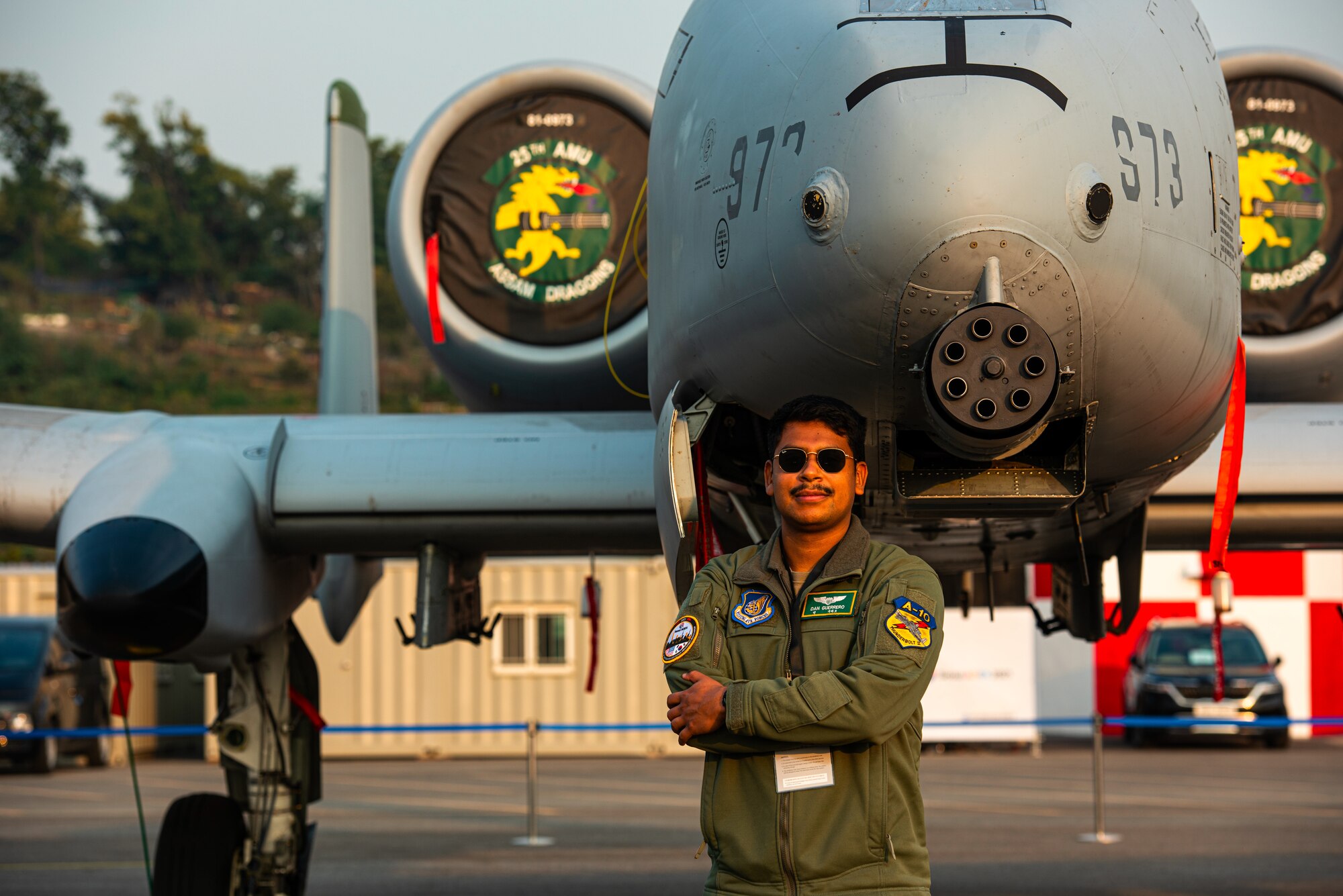 1st Lt. Daniel Guerrero, 25th Fighter Wing Squadron A-10 Thunderbolt II pilot, stands with the A-10 static display at the Seoul International Aerospace and Defense Exhibition, also known as Seoul ADEX 21, Oct. 21, 2021.