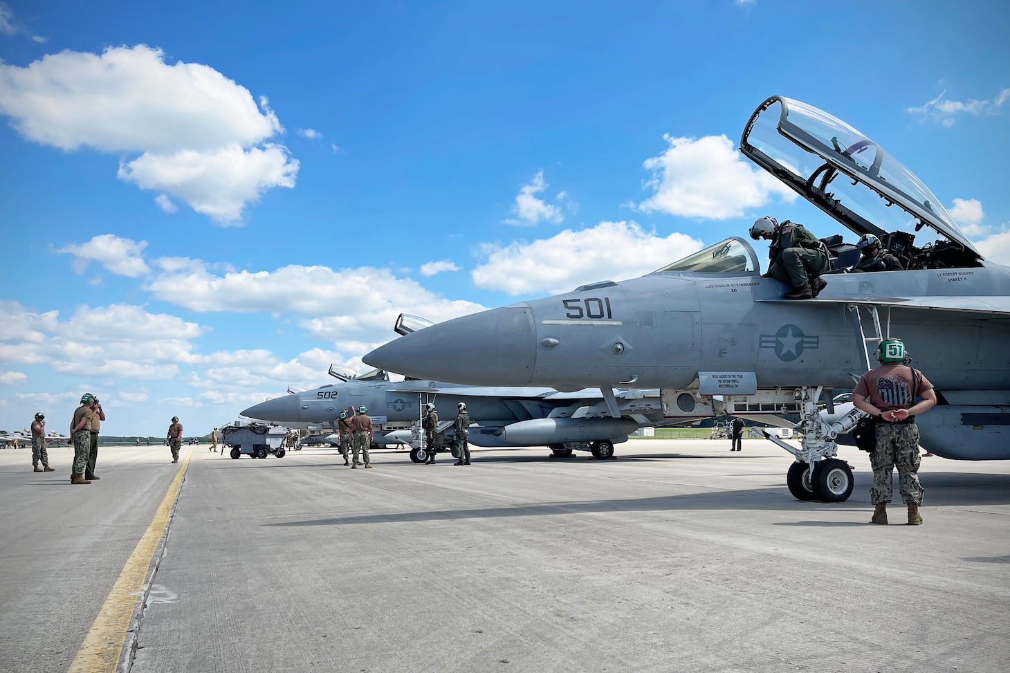 CAMP DOUGLAS, Wisc. (Aug. 17, 2021) EA-18G Growlers assigned to the "Star Warriors" of Electronic Attack Squadron (VAQ) 209 prepare for flight operations during Northern Lightning 2021 at Volk Field National Guard Base. Northern Lightning is a full-spectrum Counterland training exercise hosted at Volk Field Air National Guard Base. The goal of the exercise is to provide a tailored, cost effective and realistic combat training for the Department of Defense Total Force. (U.S. Navy photo by Cmdr. Pete Scheu)