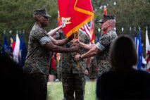 U.S. Marine Corps Lt. Gen. Robert F. Hedelund (Right), the outgoing commander of Fleet Marine Force, Atlantic (FMFLANT), Marine Forces Command (MARFORCOM), Marine Forces Northern Command (MARFORNORTH), relinquishes command to Maj. Gen. Michael E. Langley (Left), the incoming FMFLANT, MARFORCOM, MARFORNORTH, commanding general during a succession of command ceremony at Naval Support Activity Hampton Roads, Norfolk, Virginia, Oct. 25, 2021. The succession of command ceremony is a military tradition that signifies all responsibilities and authorities being transferred from one commander to another. The new commanding general will proceed to execute the mission of FMFLANT, MARFORCOM and MARFORNORTH in provisioning joint capable Marine Corps forces, direct deployment planning and execution of Service-retained operating forces in support of the Combatant Commander. (U.S. Marine Corps photo by Lance Cpl. Angel Alvarado)
