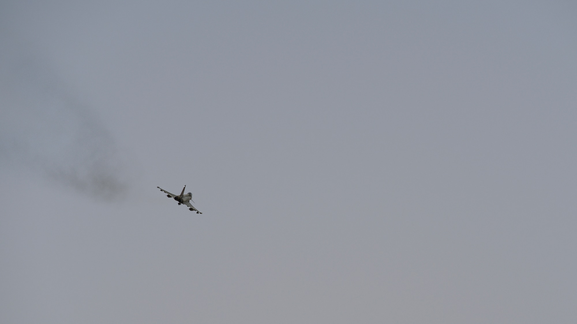 Italian Air Force (Aeronautica Militare) Eurofighter Typhoon flies above Udairi Range, Kuwait, Oct. 21, 2021. USAF JTACs deployed to the 82nd EASOS, along with the U.S. Army 1st Battalion 194th Armor Regiment joint fires observers in-training, and the ITAF Task Group Typhoon practiced close air support, fostered enduring partnerships and advanced its decisive combat dominance during a live-fire training exercise. (U.S. Air Force photo by Staff Sgt. Ryan Brooks)