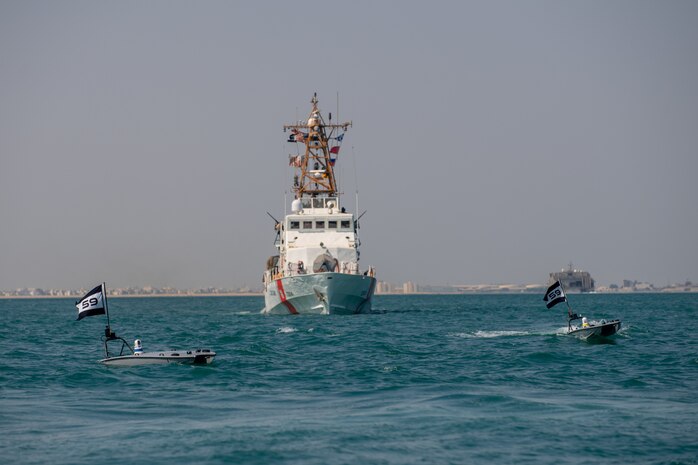 Two MANTAS T-12 unmanned surface vessels (USV), front, operate alongside U.S. Coast Guard patrol boat USCGC Maui (WPB 1304) during exercise New Horizon in the Arabian Gulf, Oct. 26. Exercise New Horizon was U.S. Naval Forces Central Command Task Force 59’s first at-sea evolution since its establishment Sept. 9.