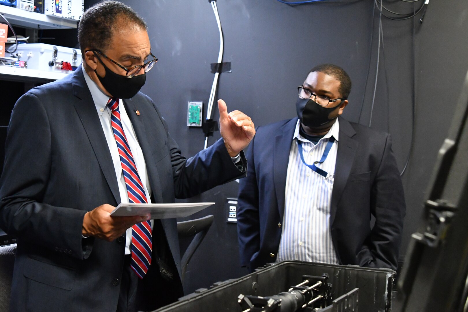 IMAGE: Dr. Victor McCrary from the University of the District of Columbia talks with Directed Energy scientist Dr. Chris Brown during a visit to Naval Surface Warfare Center Dahlgren Division, Oct. 22.