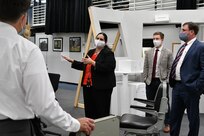 IMAGE: Dr. Liz Haro explains human systems integration concepts to Naval Surface Warfare Center Dahlgren Division guests Dr. Jim Moreland (pictured) and Dr. Victor McCrary during a visit to Dahlgren as Alex Kniffen and Gordon Shaw stand ready to assist.