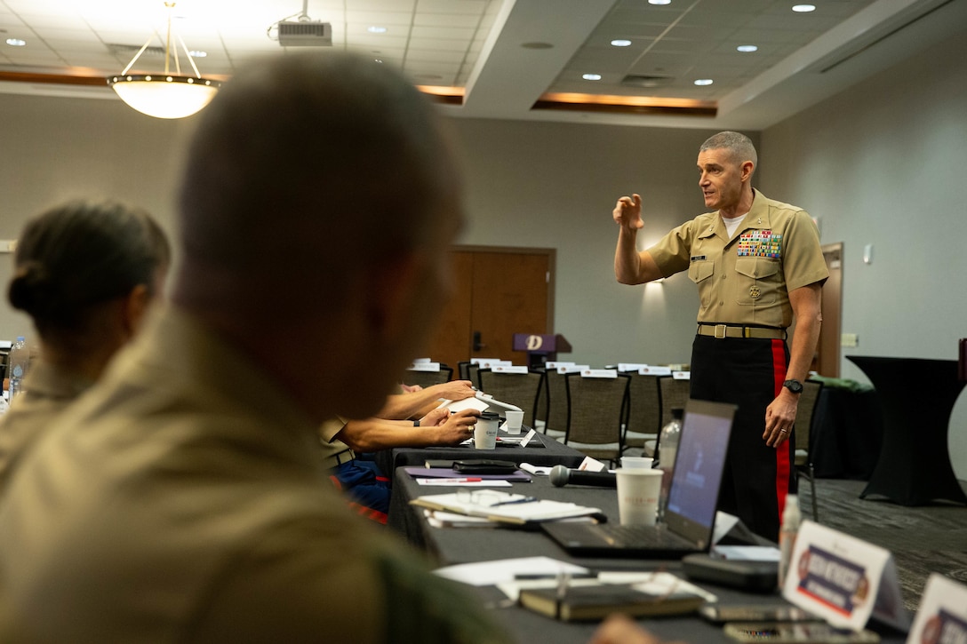 U.S. Marine Corps Maj. Gen. Jason Q. Bohm, Marine Corps Recruiting Command Commanding General, delivers opening remarks at the MCRC National Operations and Training Symposium in San Antonio, Texas, Oct. 20. This annual event recognizes recruiting stations on making mission for Fiscal Year 21 and prepares for the upcoming challenges of FY22.